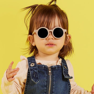 A child wearing sunglasses