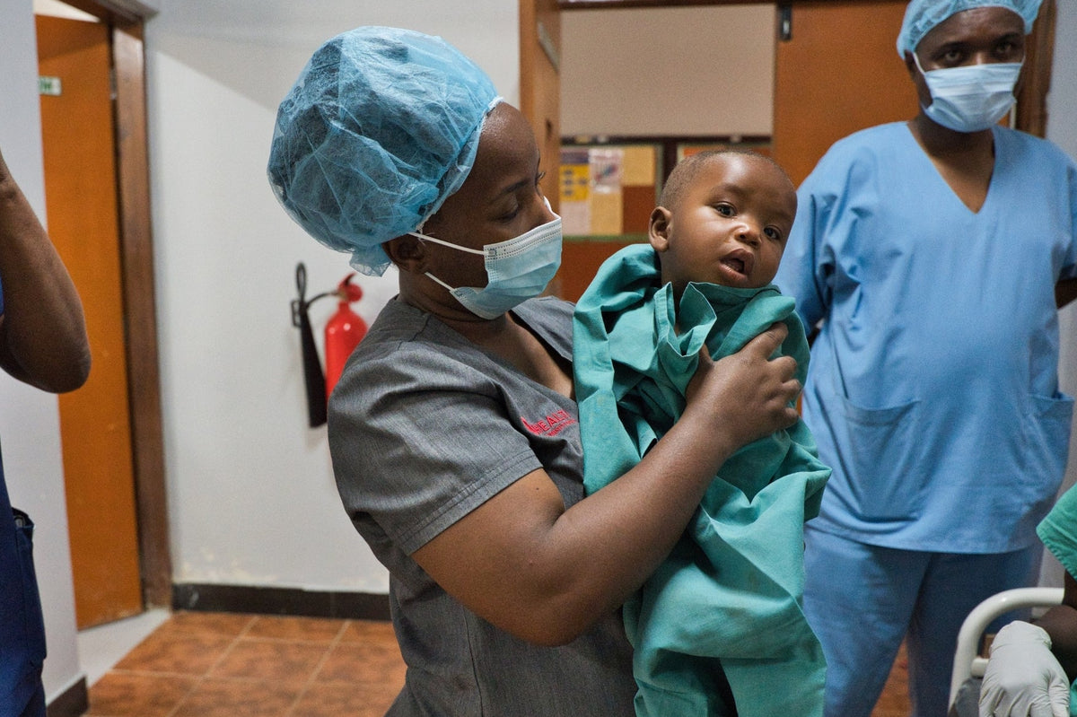A child receiving eye care with Sightsavers support