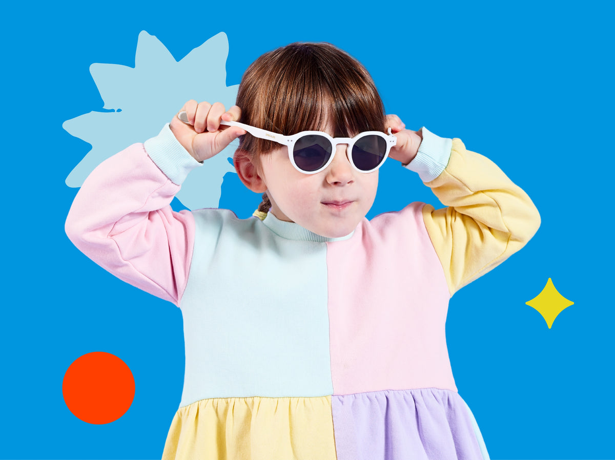 Patch on a smiling child, designs fanned out