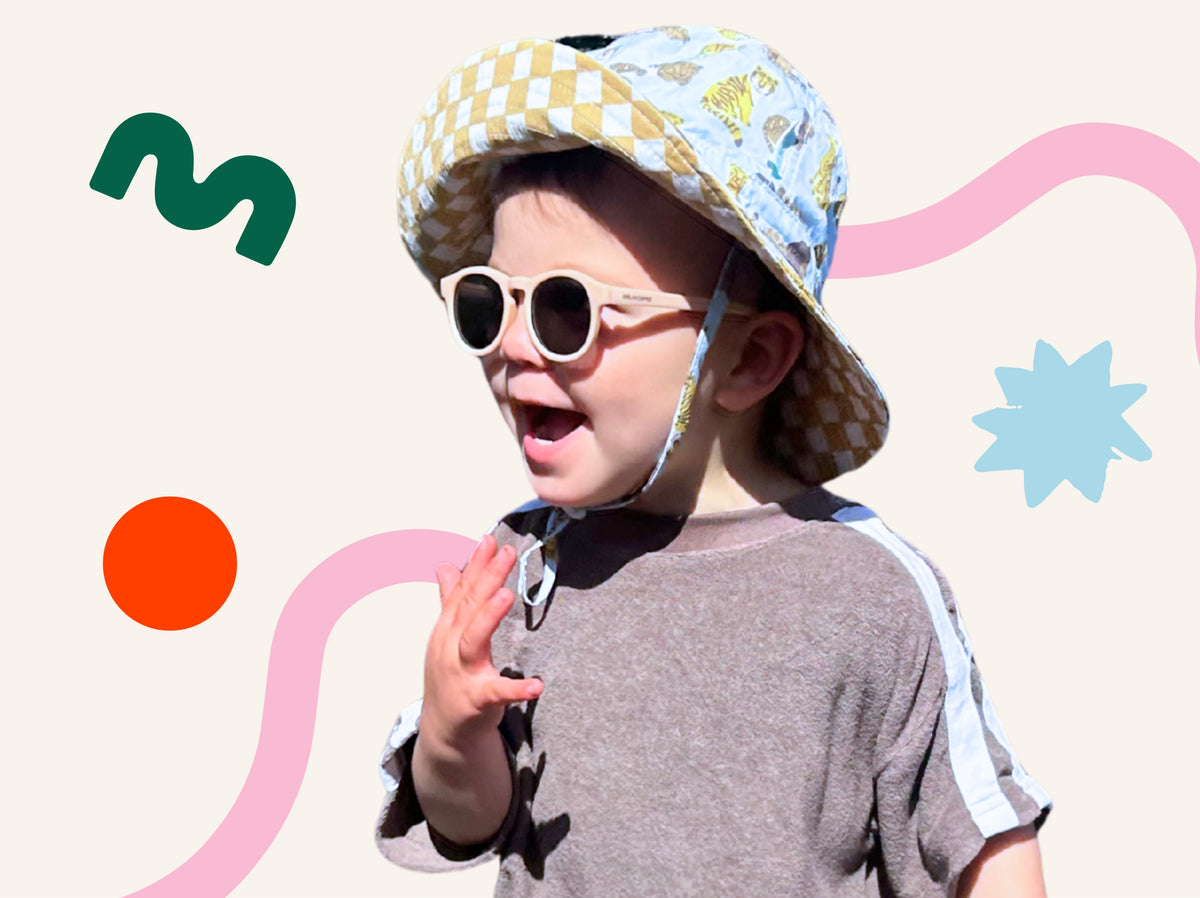 Patch on a smiling child, designs fanned out